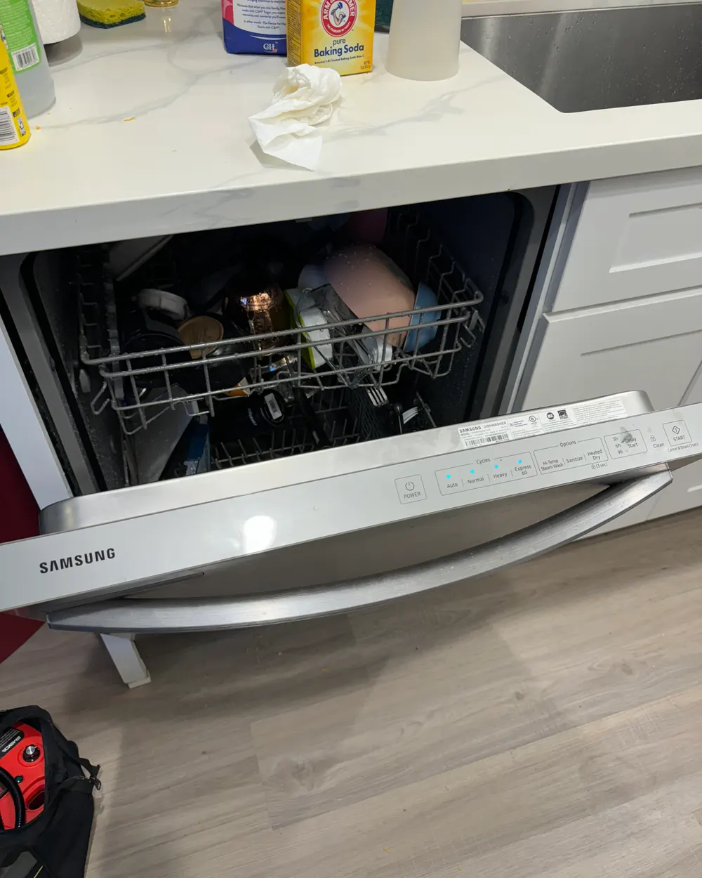 Samsung dishwasher opened up to clear a drain fault in an Escondido kitchen