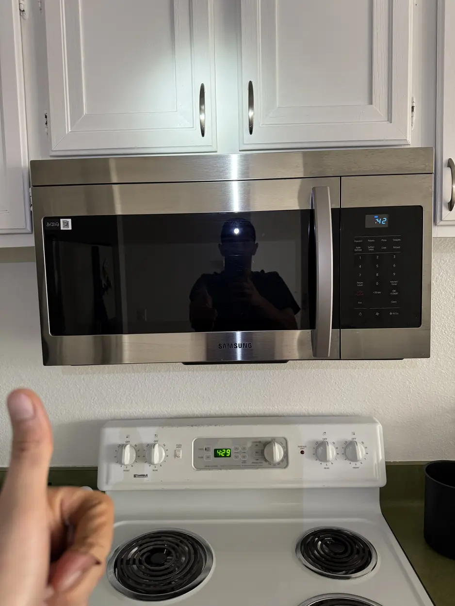 Over-the-range microwave and range serviced during a North County visit