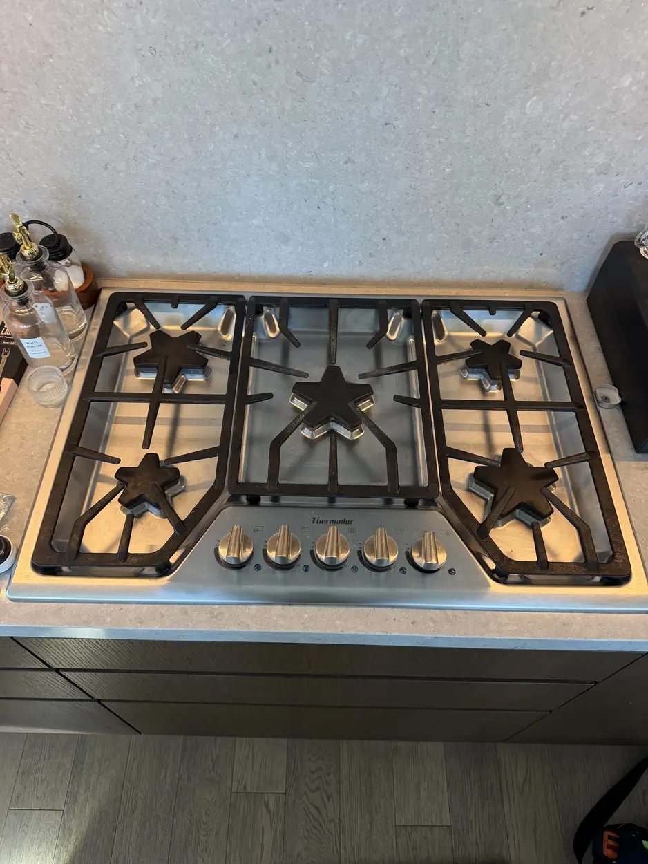 Five-burner Thermador gas cooktop serviced in a North County kitchen