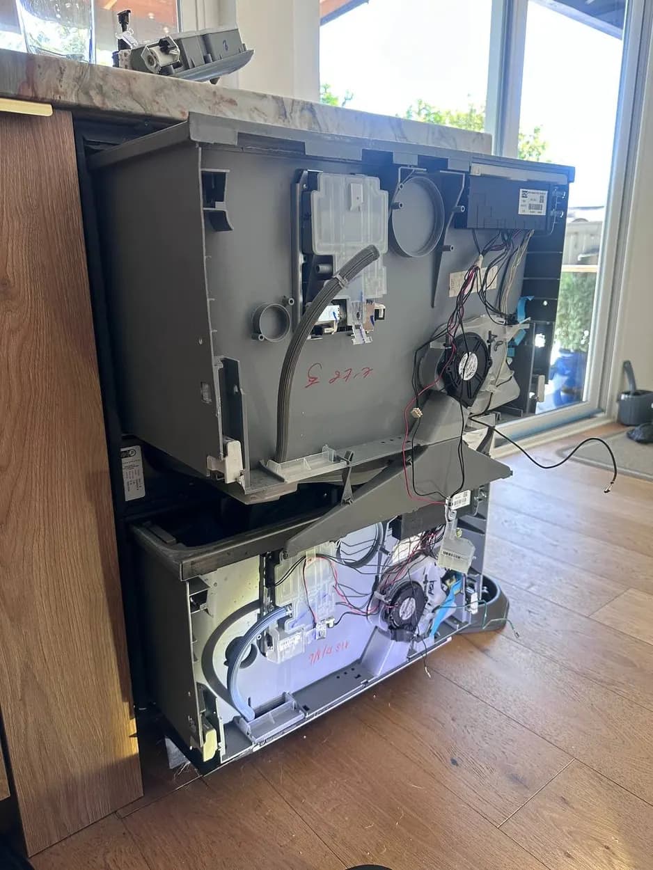 Dishwasher pulled out to clear a drain fault in an Escondido kitchen