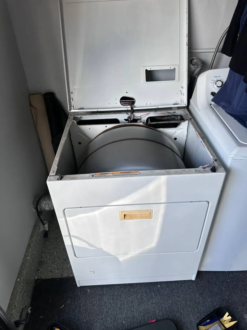 Dryer opened at the top to reach the drum in San Marcos
