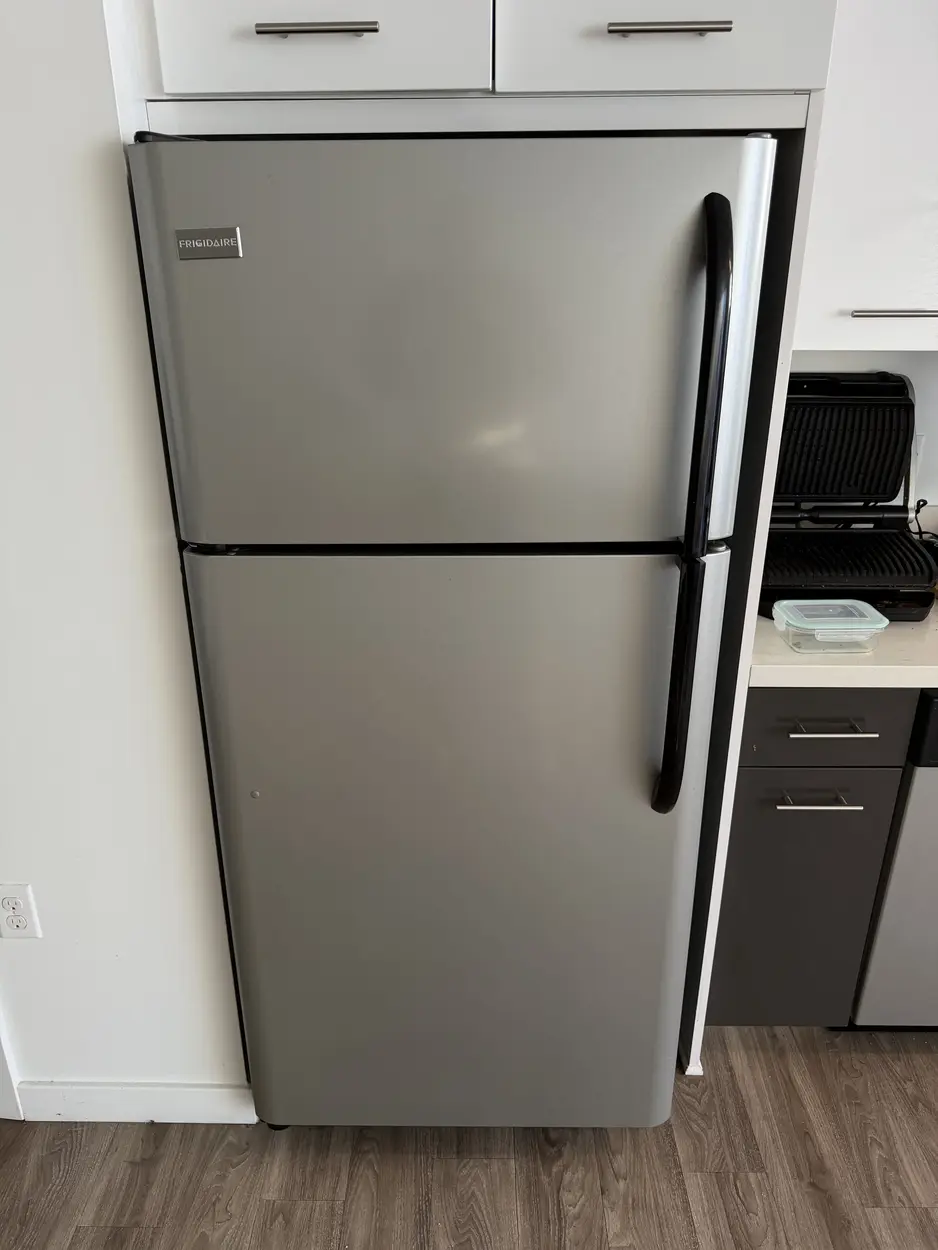 Frigidaire top-freezer refrigerator serviced in a Vista kitchen