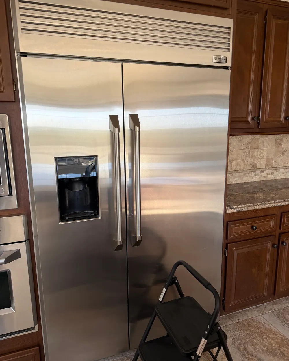 Built-in GE Monogram refrigerator serviced in an Escondido kitchen