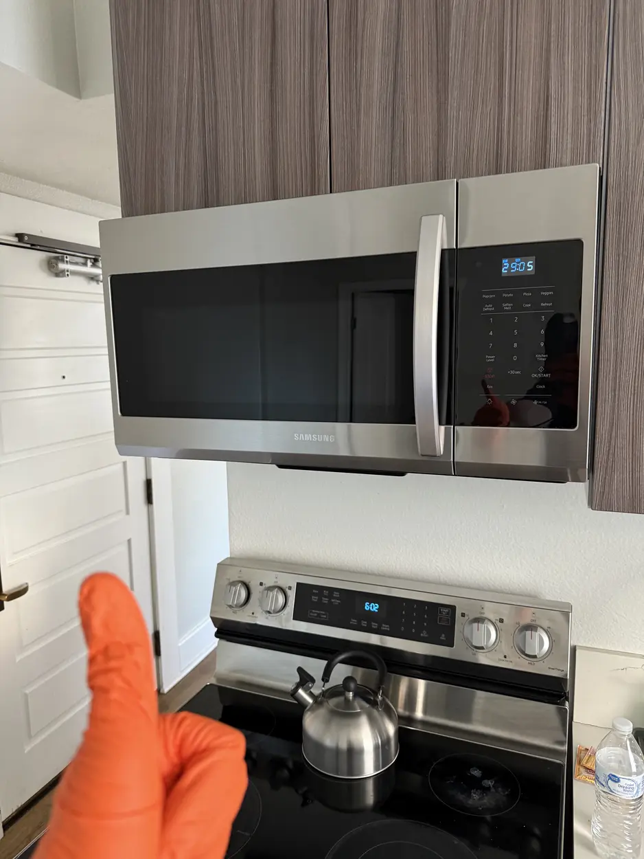 Over-the-range microwave serviced above the range during an Escondido repair