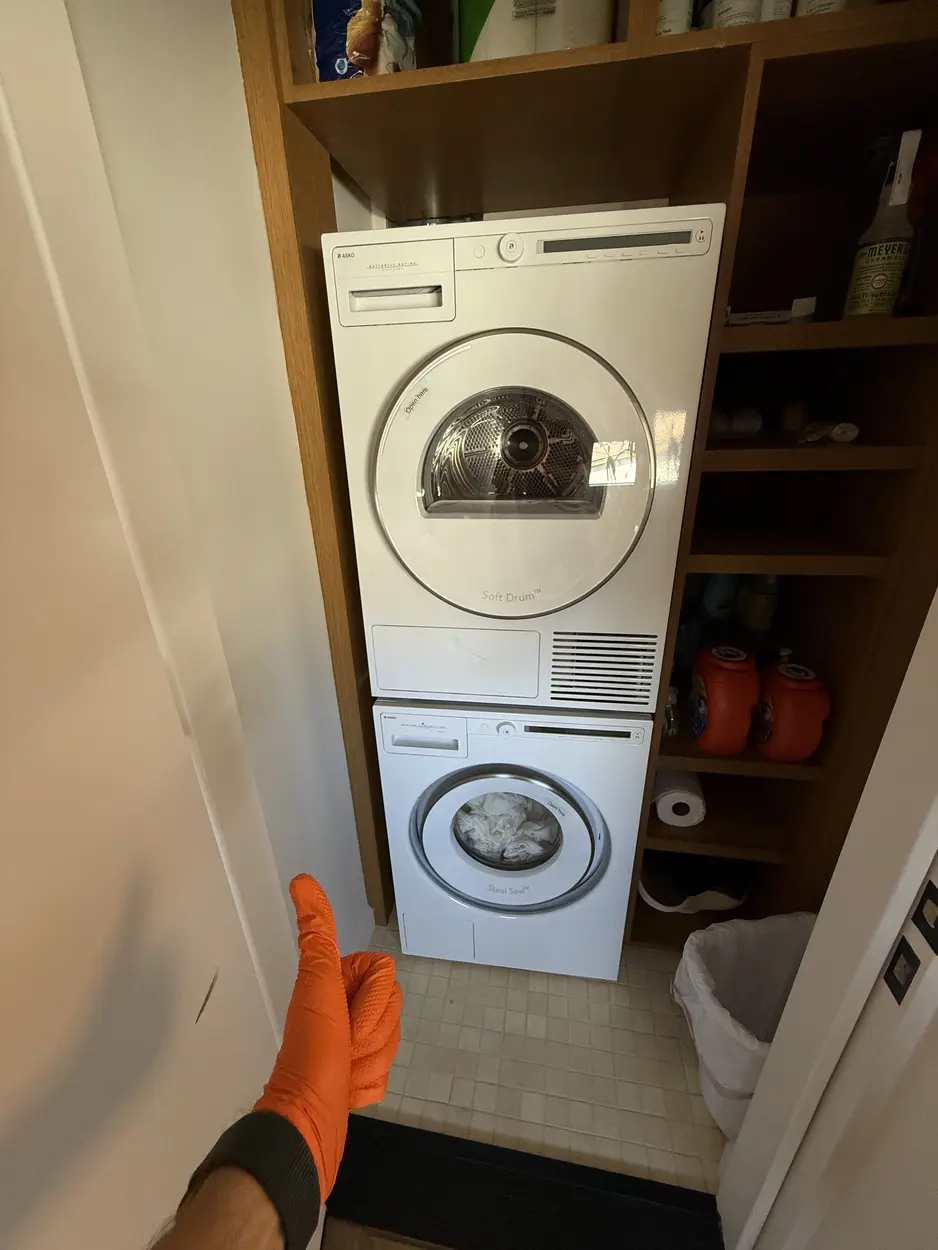 Front-load washer and dryer pair checked during a North County service call